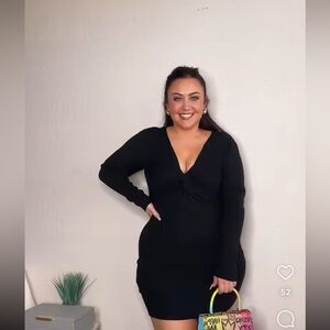 Only worn in try on Black mini dress with twist detail. Size large